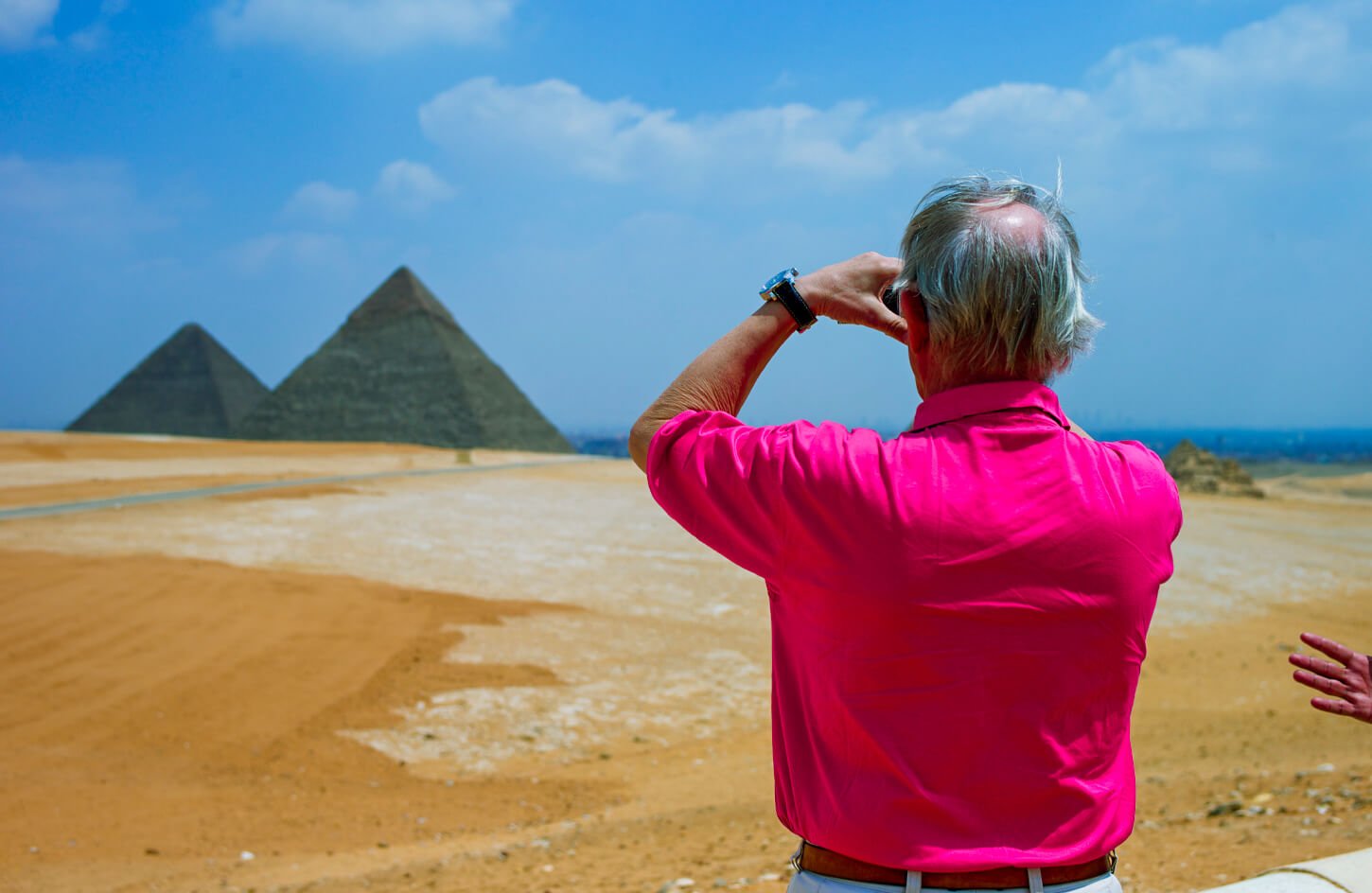 A-picture-of-a-visitor-photographing-the-Great-Pyramids-of-Giza