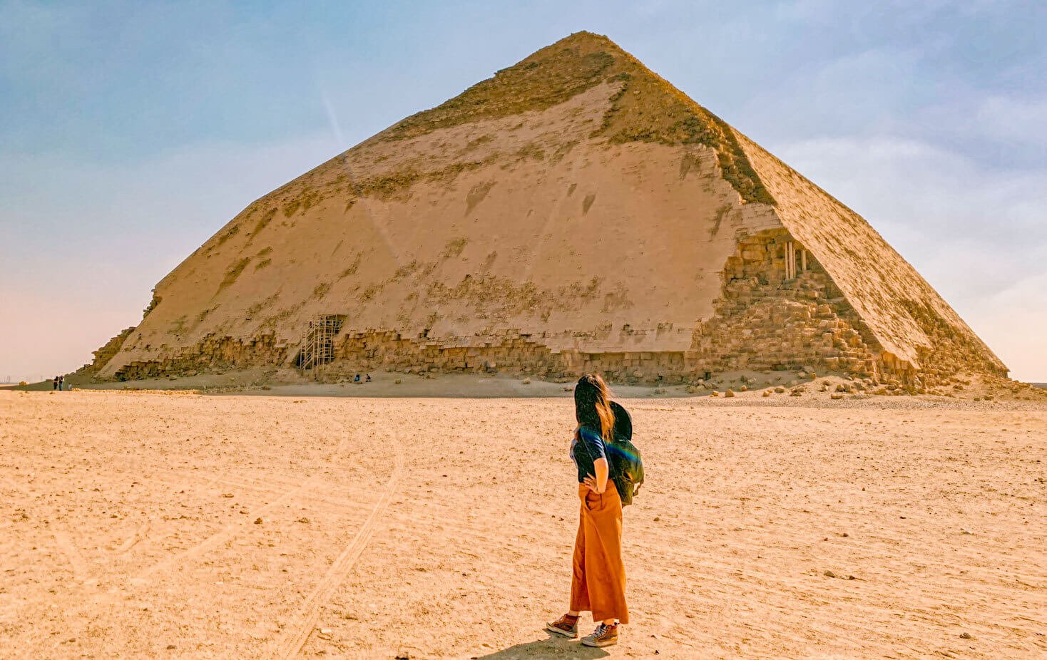 young-woman-stand-infront-of-bent-pyramid